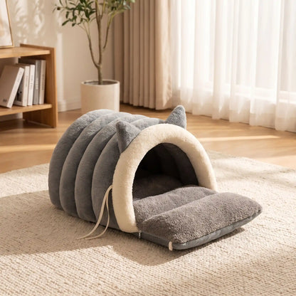 couchage pour chat gris plante rideaux blanc livre